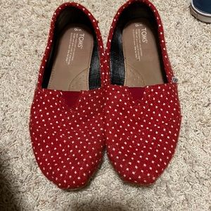 Gently used red and white polka dot Toms